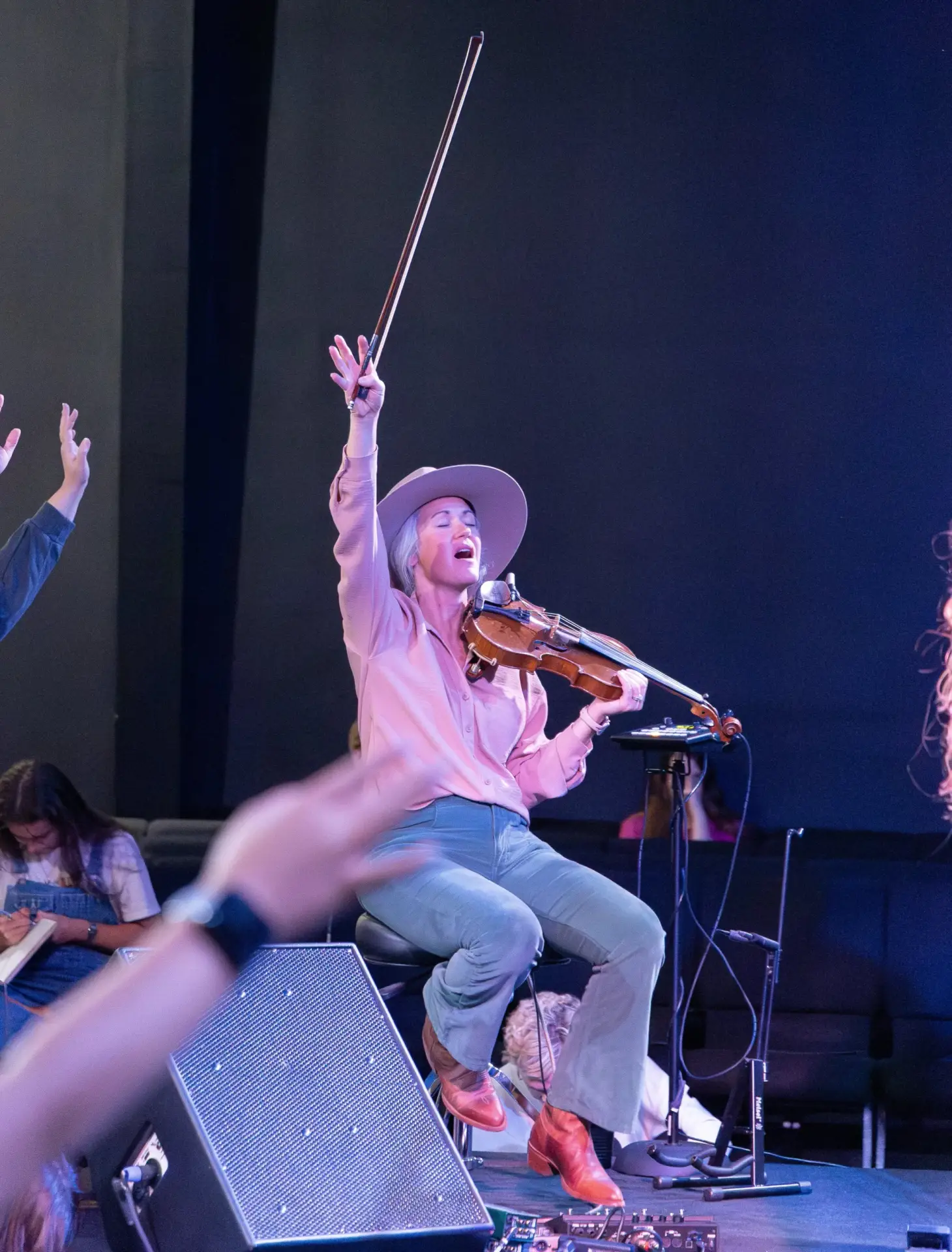 Violinist leading worship at The Homestead church in Mobile Alabama during a service using the newly installed AVL system