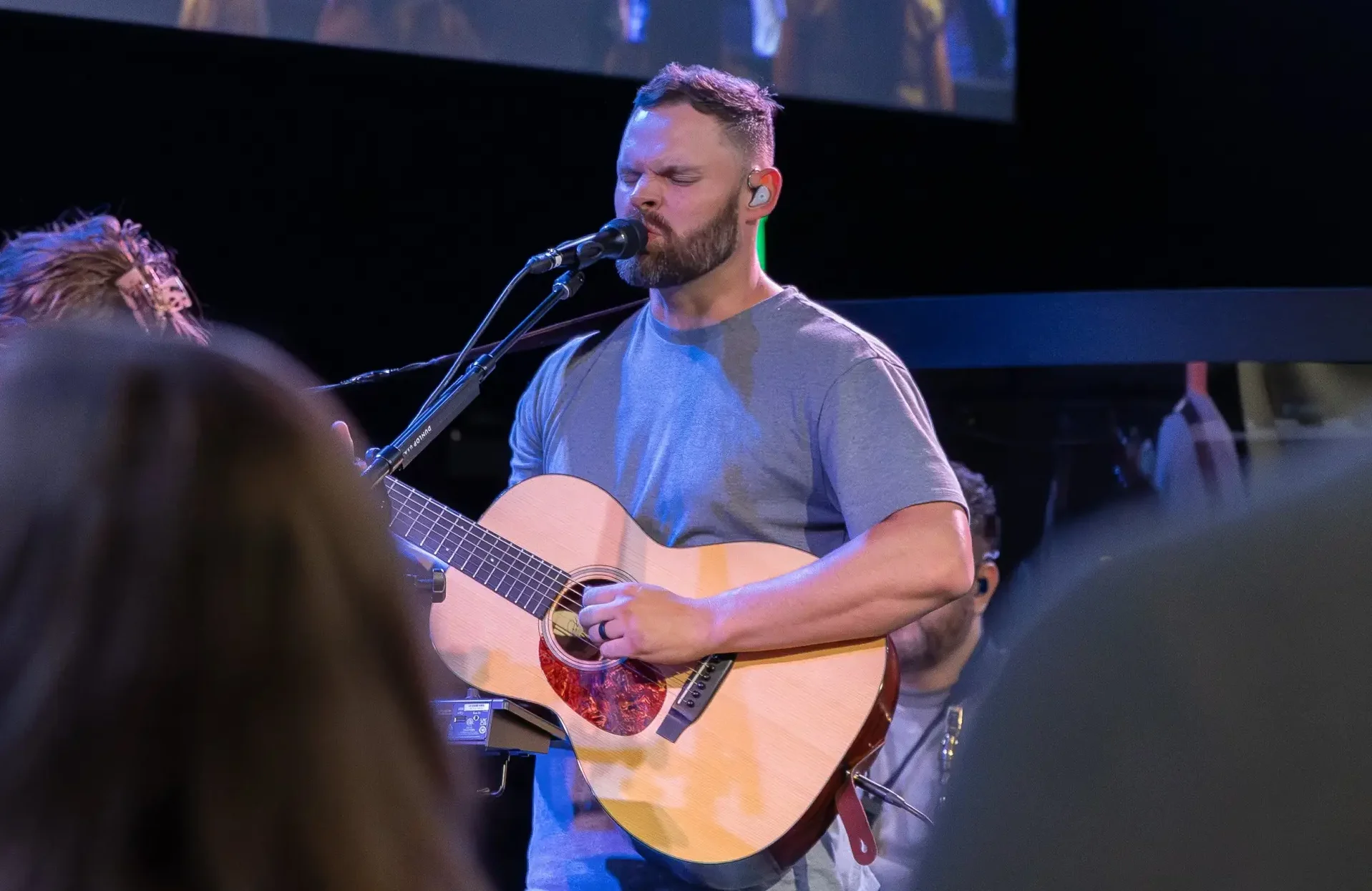 Worship singer performing at The Homestead in Mobile Alabama during a live church service
