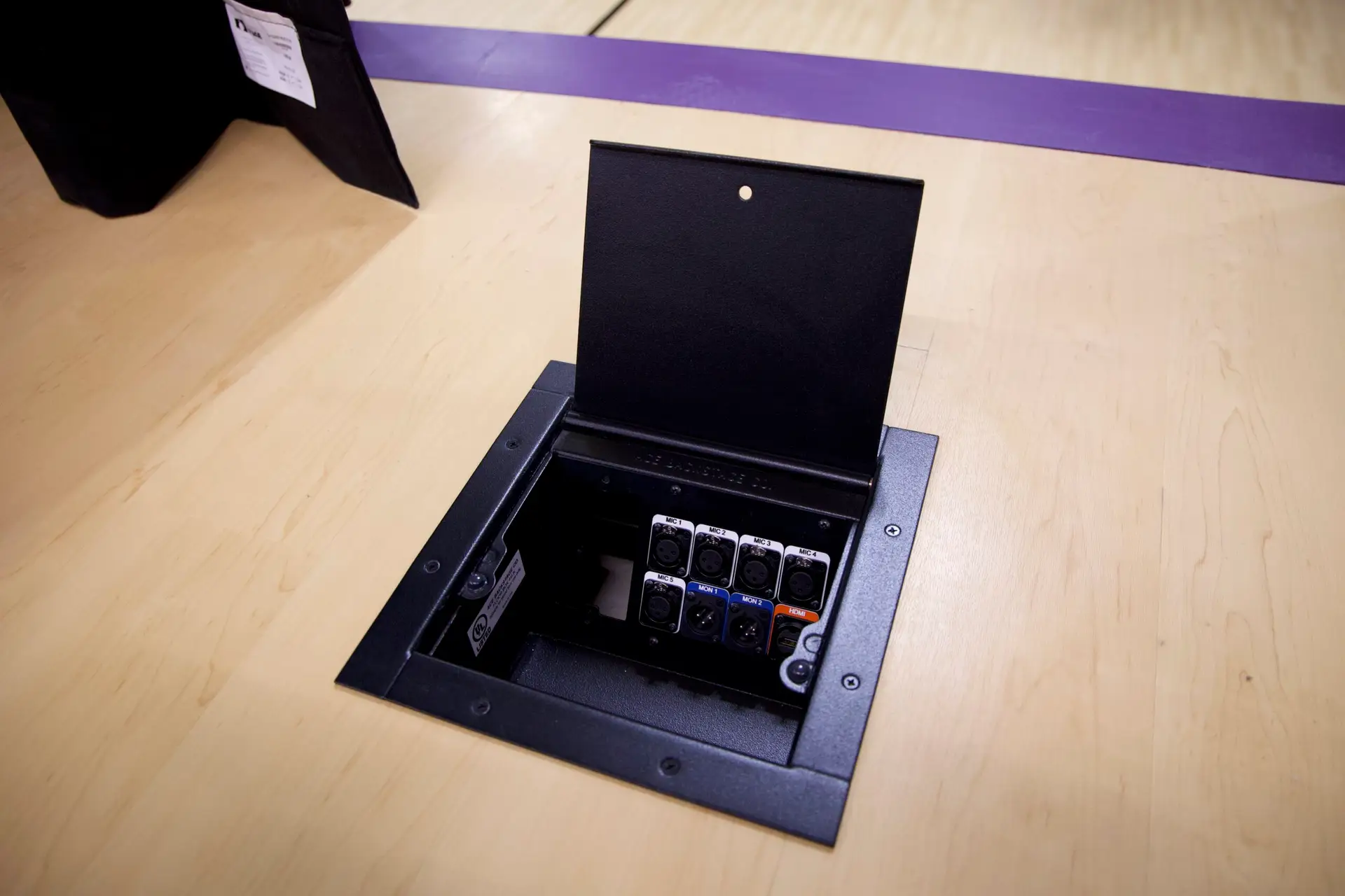 Custom Ace Backstage stage floor pocket with XLR, monitor, and HDMI connections installed in Covenant Christian School gymnasium auditorium stage floor in Mishawaka Indiana