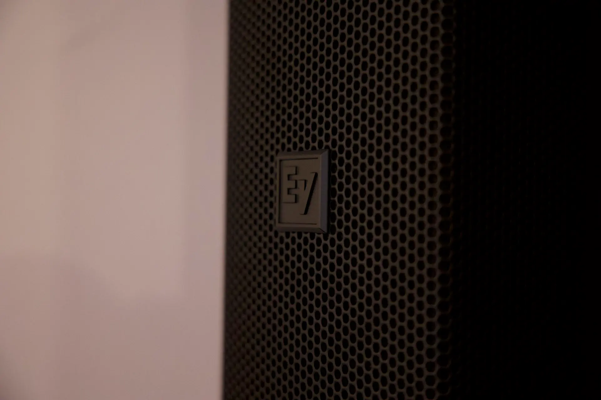 Close-up of EV column array speaker grille installed by Presence Pro Audio