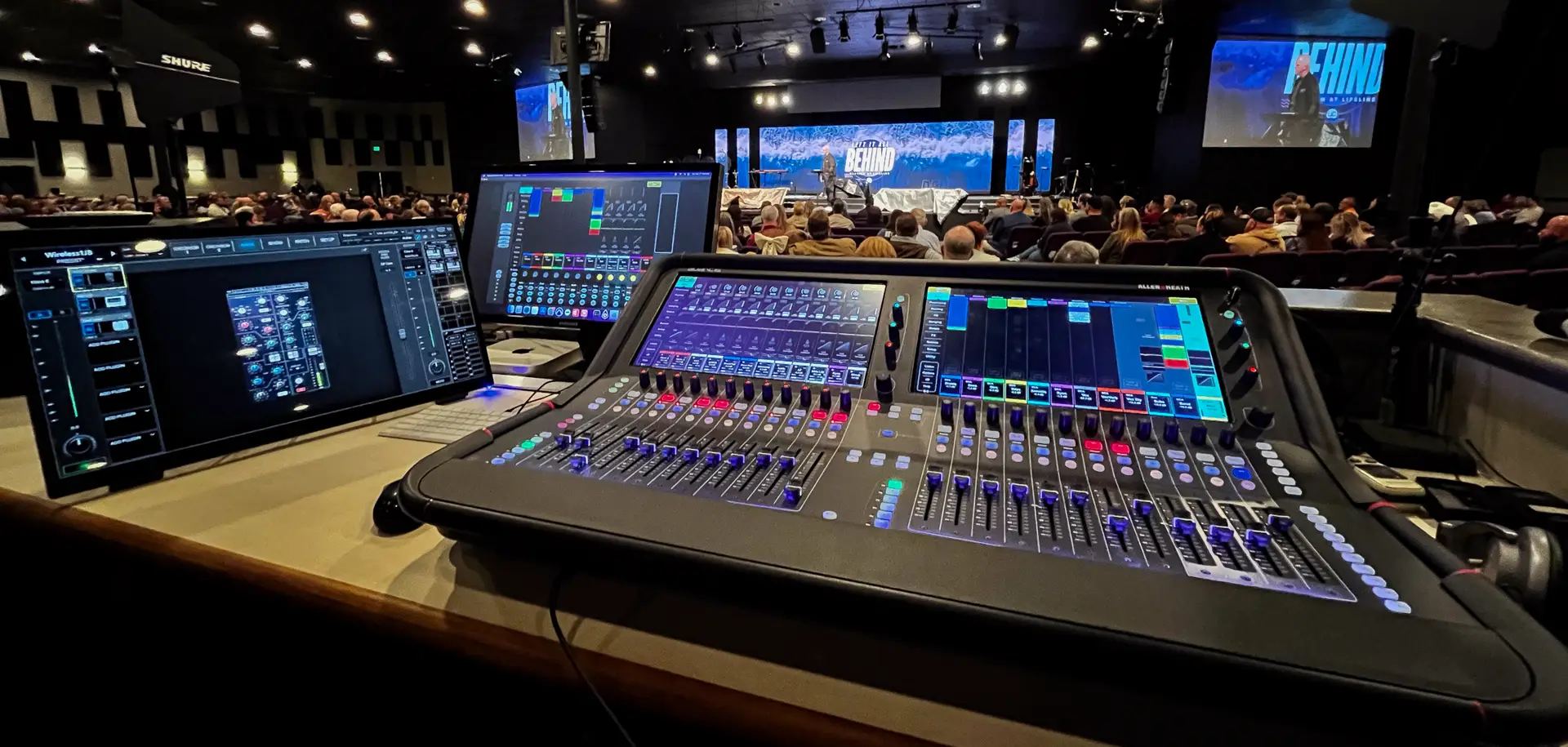 Allen & Heath dLive mixing console operating during a worship service at the church main campus